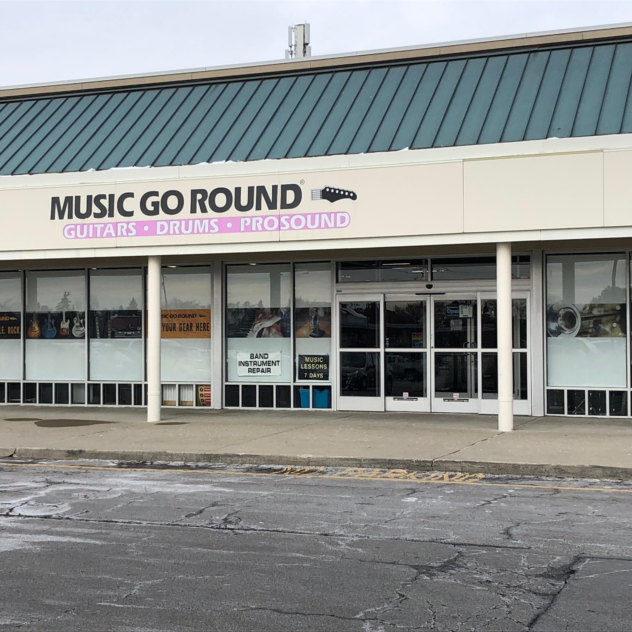 A photo of the front of the Music Go Round on Bethel Road in Columbus, Ohio. Store sign reads Music Go Round: Guitars, Drums, ProSound.